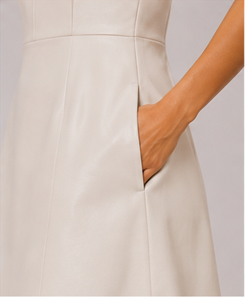 Ivory Bow Back Strapless Faux Leather Mini Dress